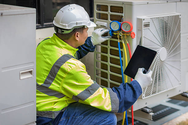 Professional Hvac technician working in Millville, UT